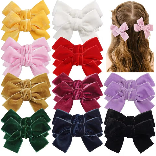 Girls velvet bow hair clip accessories in a range of color options