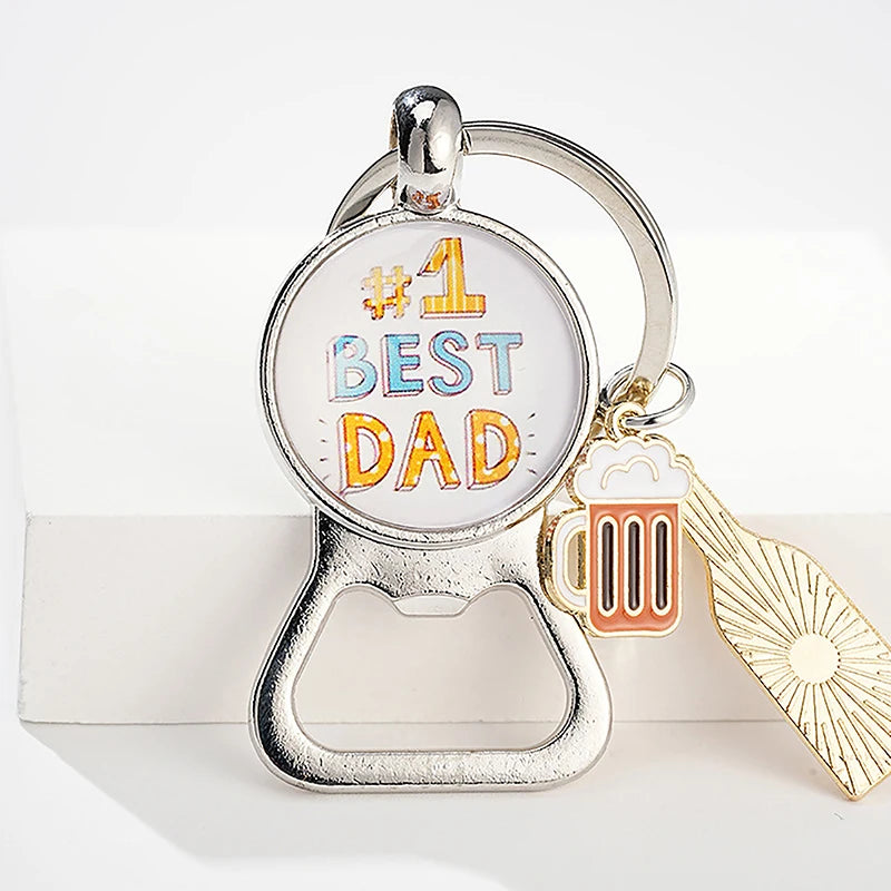 Keychain with '#1 Best Dad' text, bottle opener, and beer mug charm on a white background