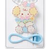 Pastel-colored hair clip with bow on a white background
