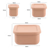 A set of three beige snack boxes in different sizes with lids.