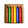 Set of six colorful crayons in a box with 'SMILOLOGY' branding on a white background