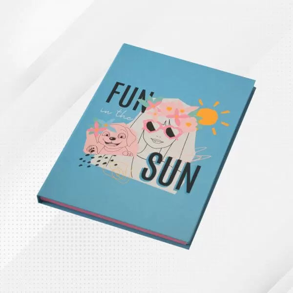 A Barbie-themed A5 diary notebook with a blue cover featuring illustrations of Barbie and other characters, with the phrase 'FUN IN THE SUN' prominently displayed.