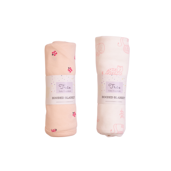 Two beautiful pink hooded blankets on a white background