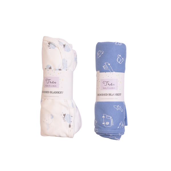 Two folded hooded blankets, one white with blue patterns and the other blue with white patterns, on a white background.