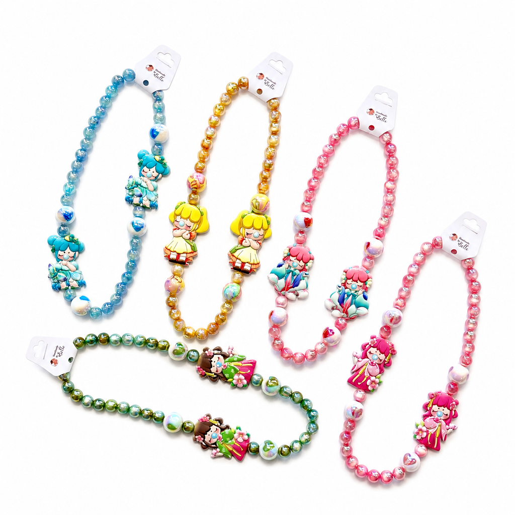 Four beaded baby necklaces and one matching beaded bracelet set, each featuring colorful cartoon character charms and pearl-like beads in blue, gold, pink, and green, displayed on a clean white background.