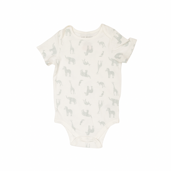 Baby onesie with animal pattern on a white background
