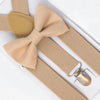 Beige bow tie and suspenders set on a white background