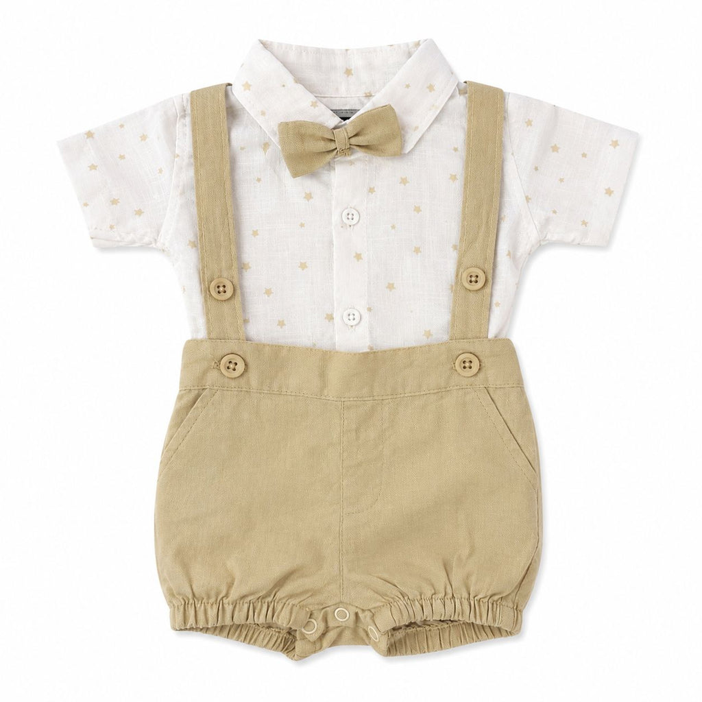 Baby outfit with white shirt, beige suspenders, and bow tie on a white background