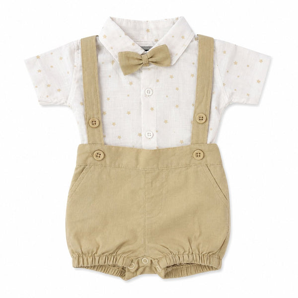 Baby outfit with white shirt, beige suspenders, and bow tie on a white background