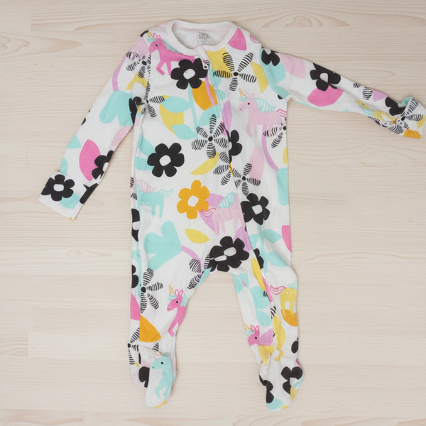 Floral-patterned long-sleeve shirt on a wooden surface