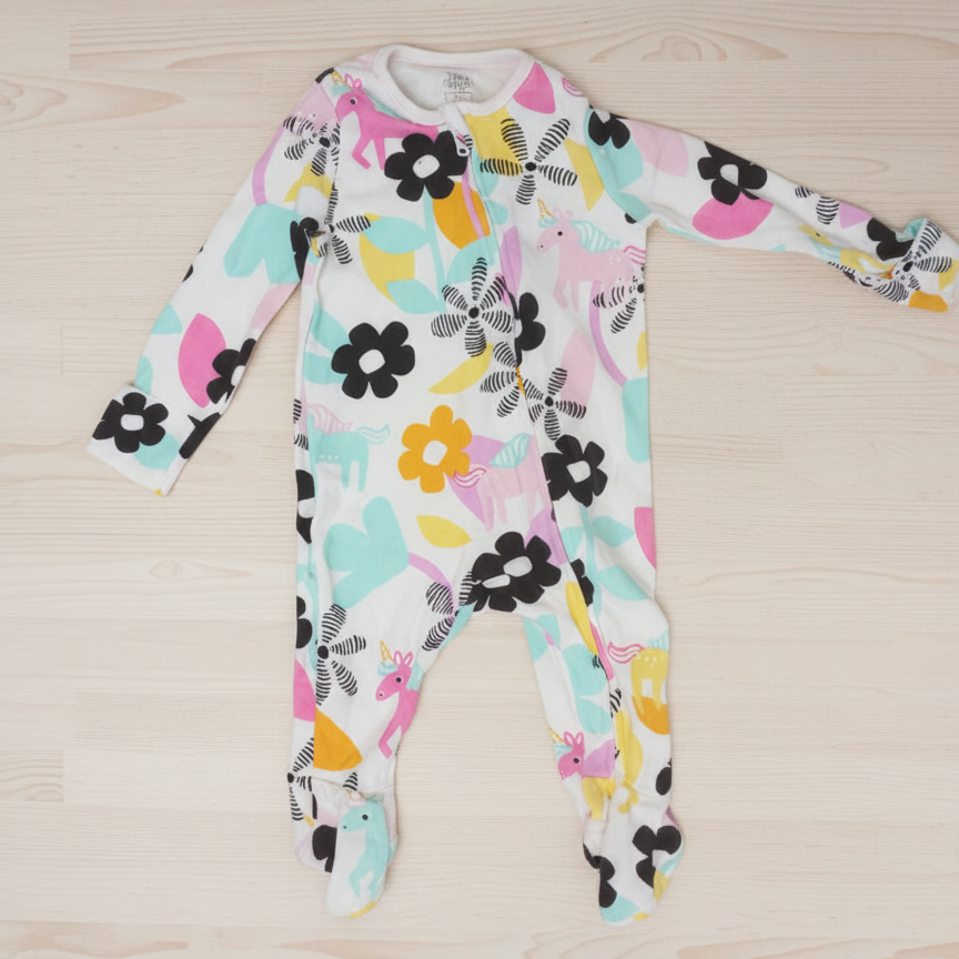 Floral-patterned long-sleeve shirt on a wooden surface