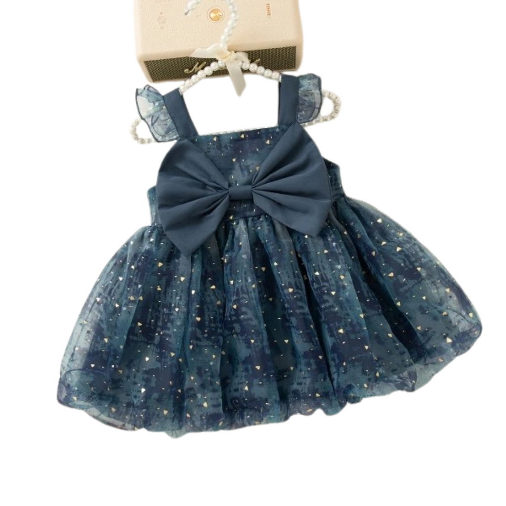 Blue dress with a large bow on a white background