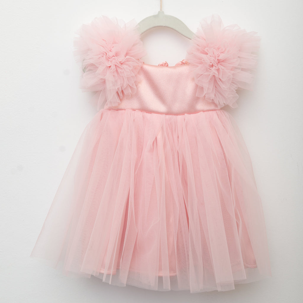 Pink tutu dress on a white background