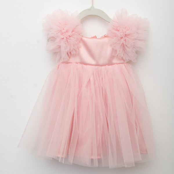 Pink tutu dress on a white background