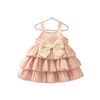 Pink dress with a large bow on a white background