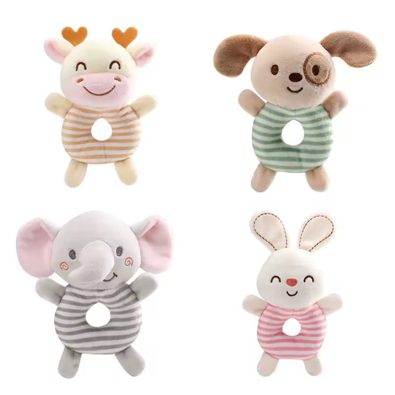 Four plush toys shaped like a cow, dog, elephant, and rabbit 