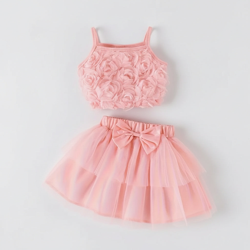 Pink floral top and skirt set on a light gray background