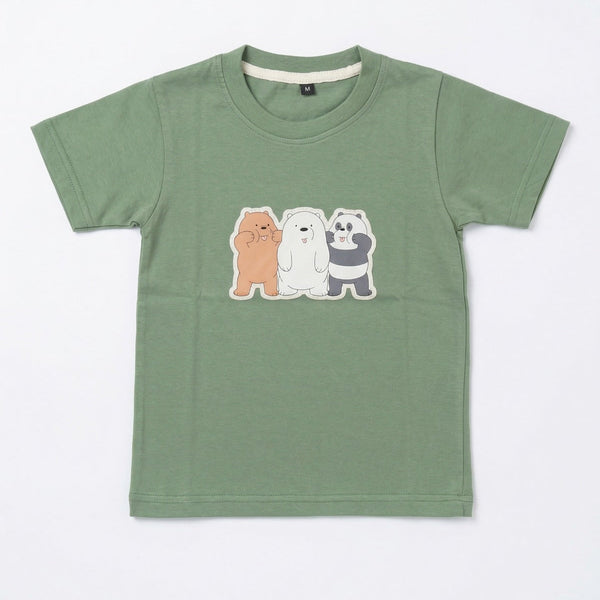 Green t-shirt with cartoon bear design on a white background