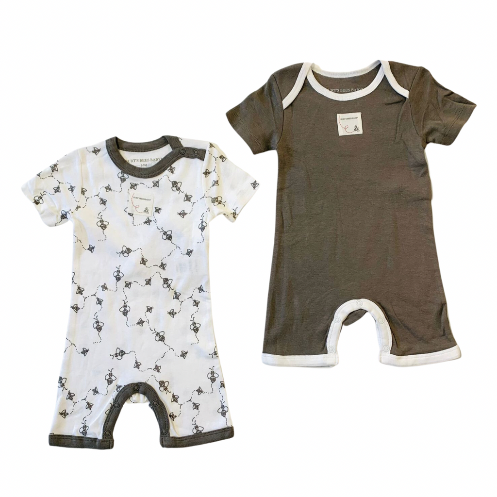 Two baby rompers, one with a bee pattern and one solid brown color, both with round neckline and snap buttons.