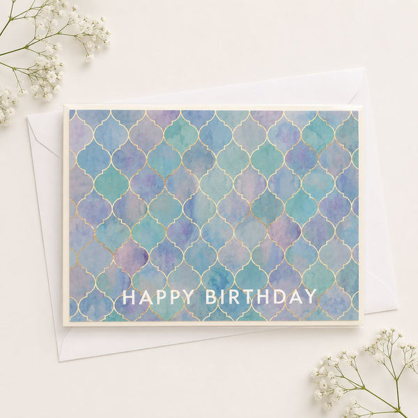 Birthday card with blue and purple pattern and 'Happy Birthday' text on a white background
