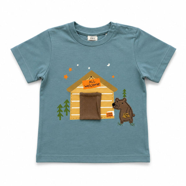 Children's t-shirt with a bear and cabin design on a blue background