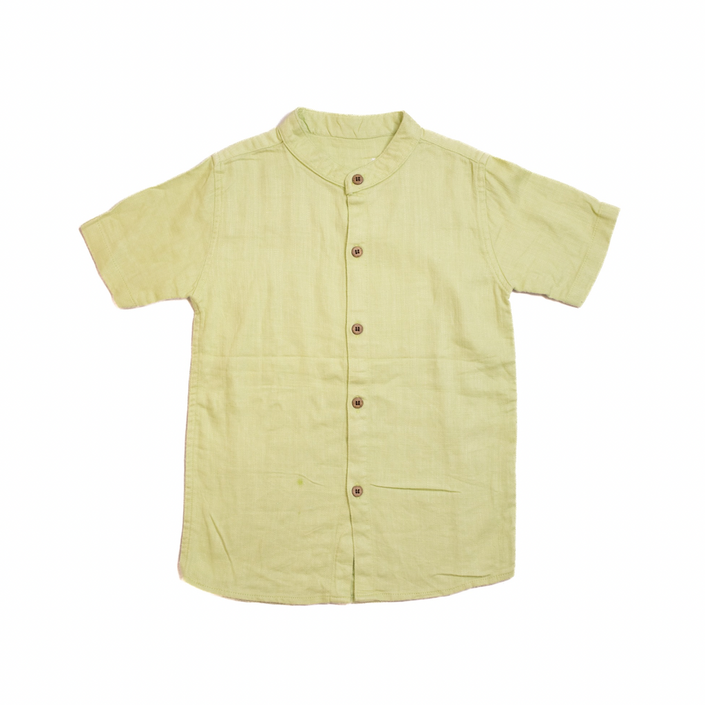 Light green short-sleeve shirt with buttons on a white background