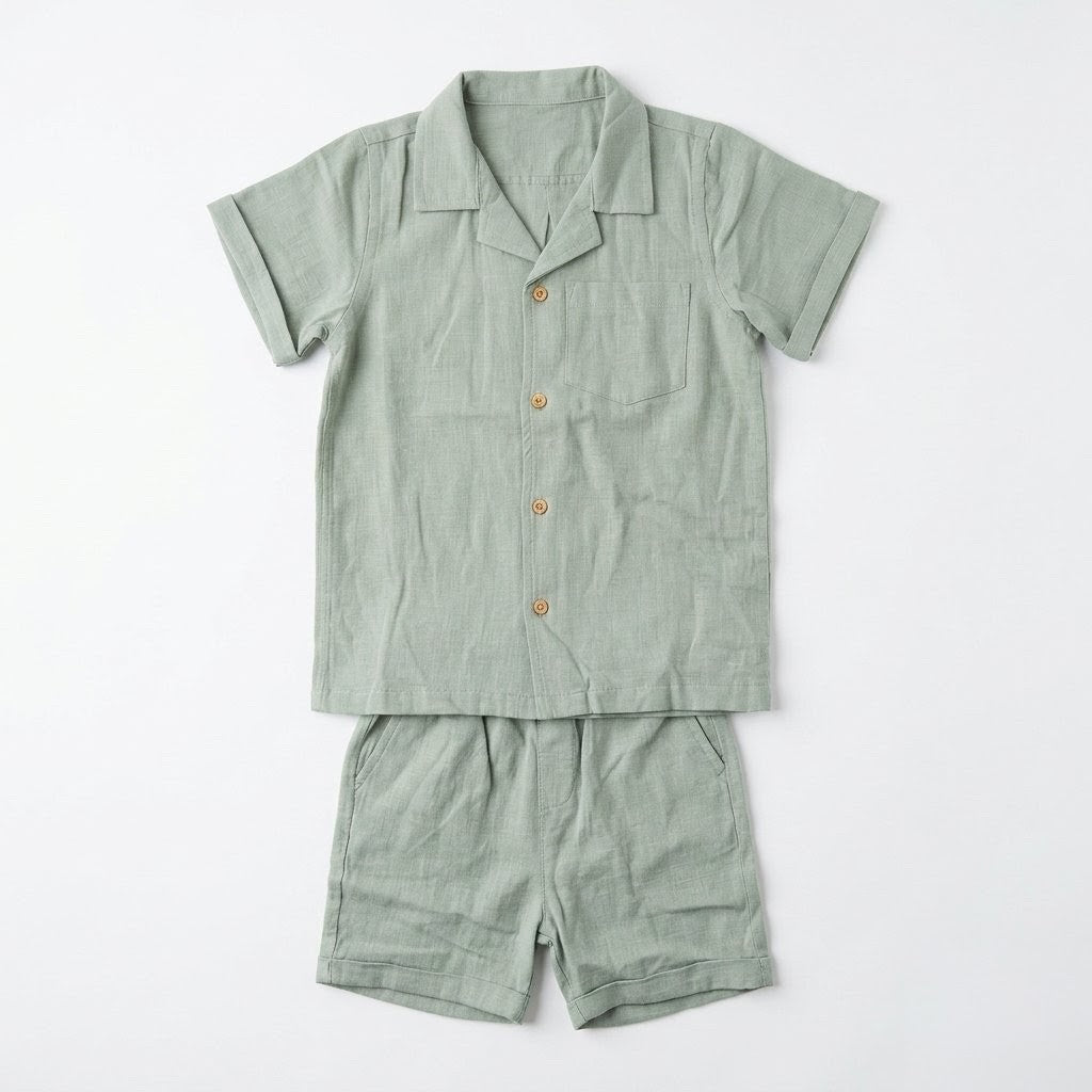 Green shirt and shorts set on a white background