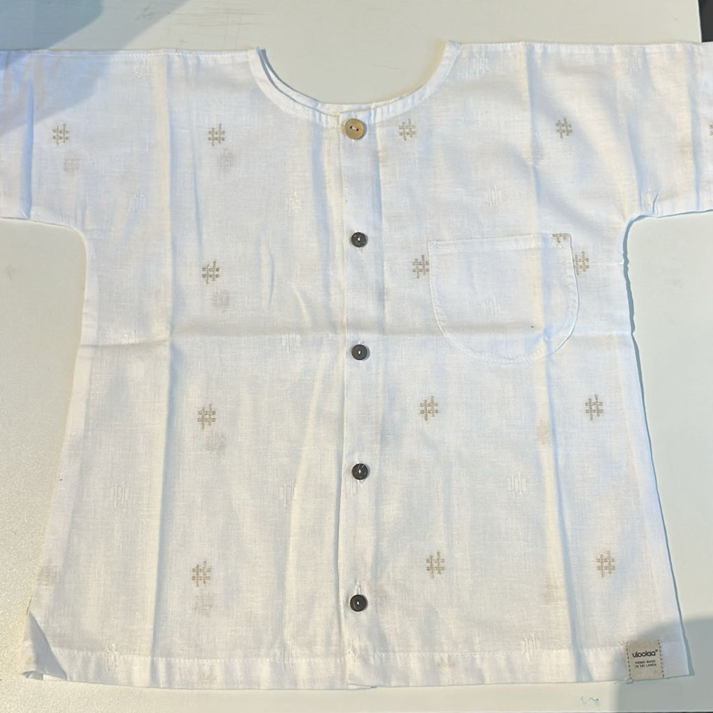 Light blue embroidered shirt on a white background