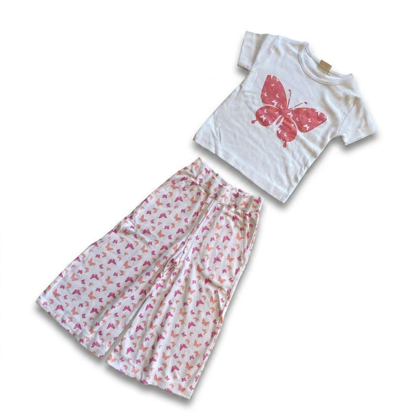 White t-shirt with pink butterfly design and matching pants on a white background