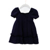 Navy blue dress with puff sleeves on a white hanger