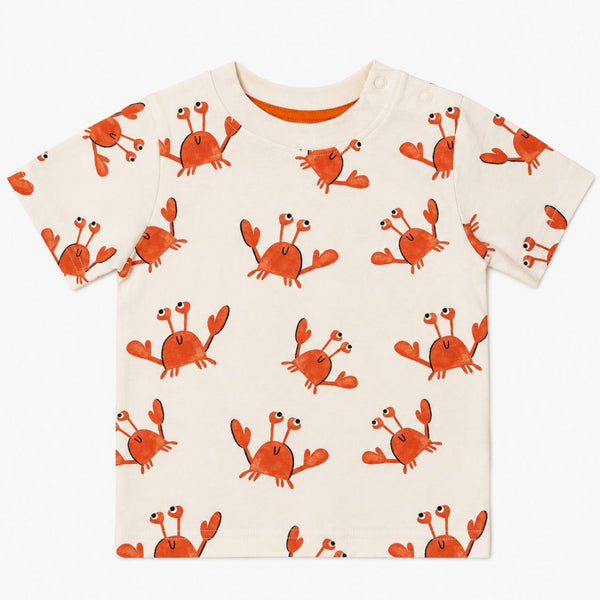 Children's t-shirt with orange crab pattern on a white background