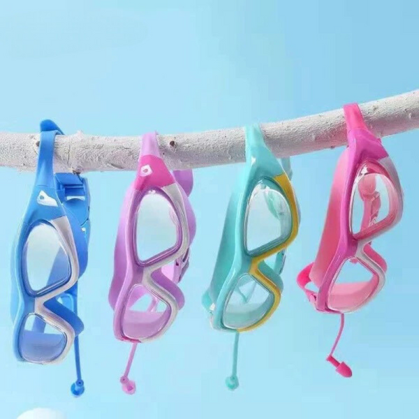 Four pairs of children's swim goggles hanging on a crossbar, with a blue pair on the left, a pink pair in the middle, and a light blue pair on the right.