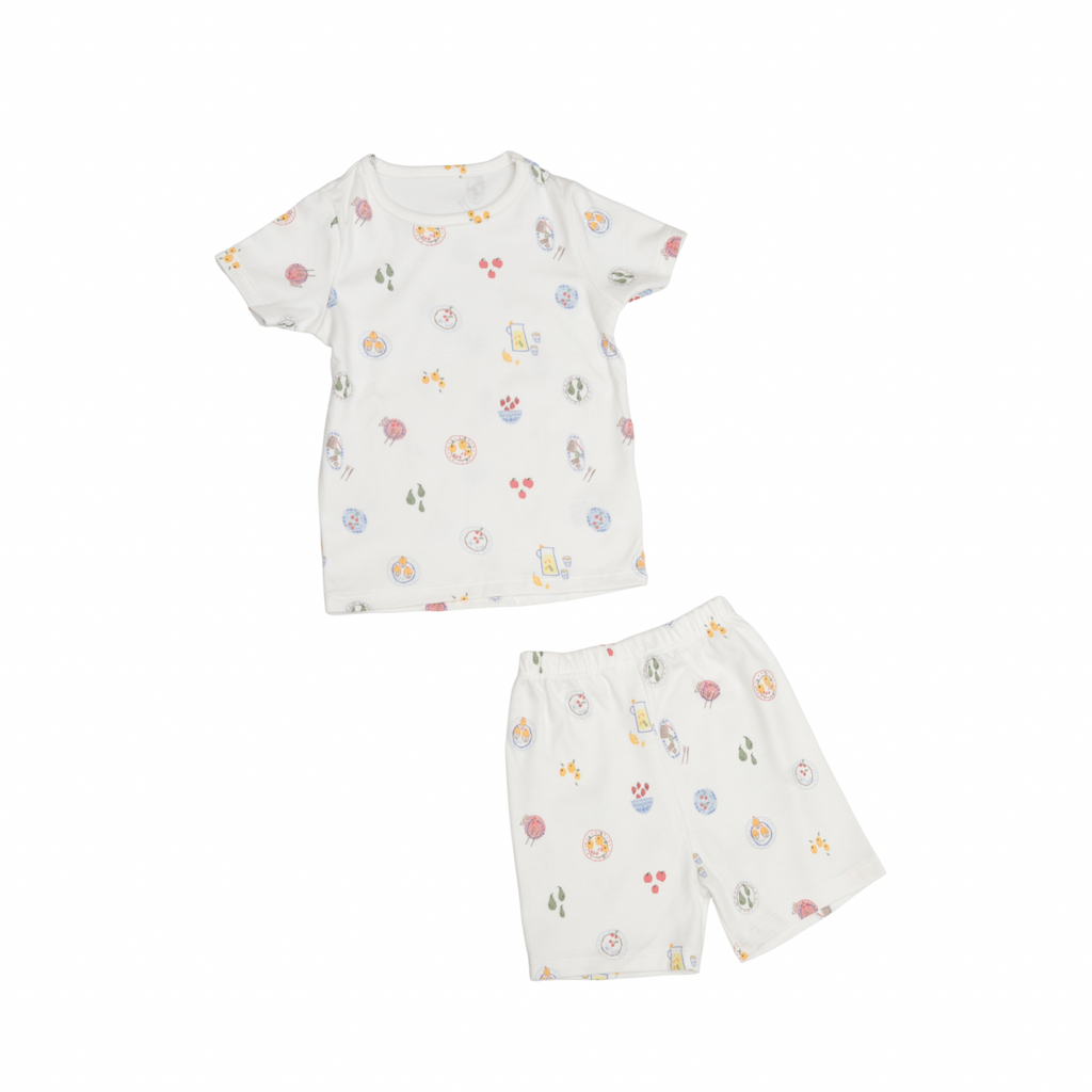Baby outfit set with t-shirt and shorts on a white background