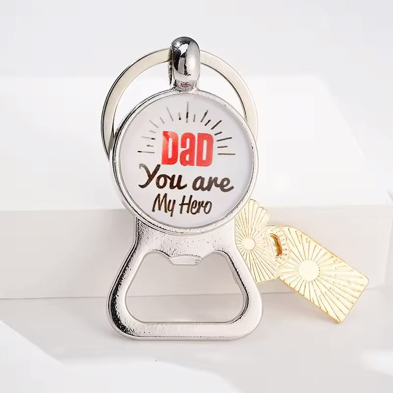 Keychain with bottle opener and 'Dad You are My Hero' text on a white background