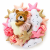 Decorative cod mobile with teddy bear, clouds, and stars on a white background