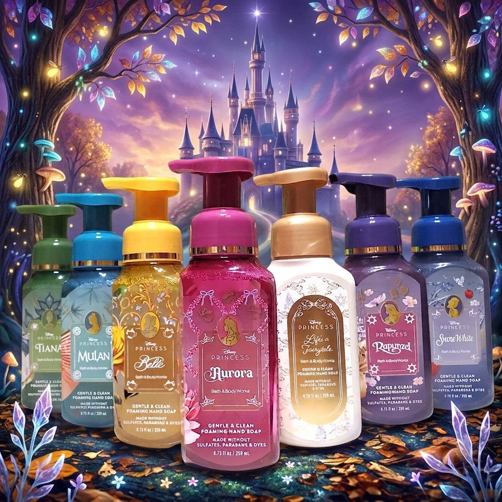 A group of Disney Princess-themed hand soap bottles arranged in front of a whimsical castle and glowing forest backdrop. The center bottle is pink and labeled Aurora, with surrounding bottles in teal, blue, gold, cream, lavender, and dark blue, each with Disney princess character artwork and pump tops.