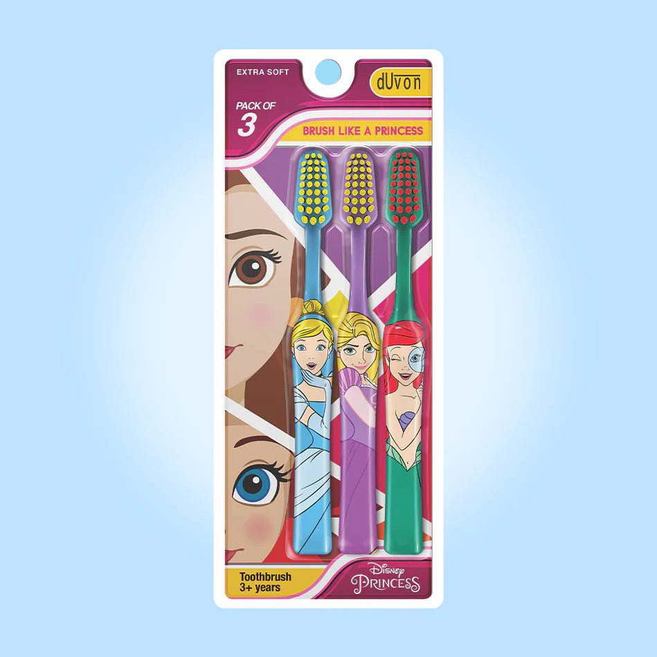 Pack of 3 Disney Princess toothbrushes in a white blister card with colorful character graphics, shown against a light blue gradient background.