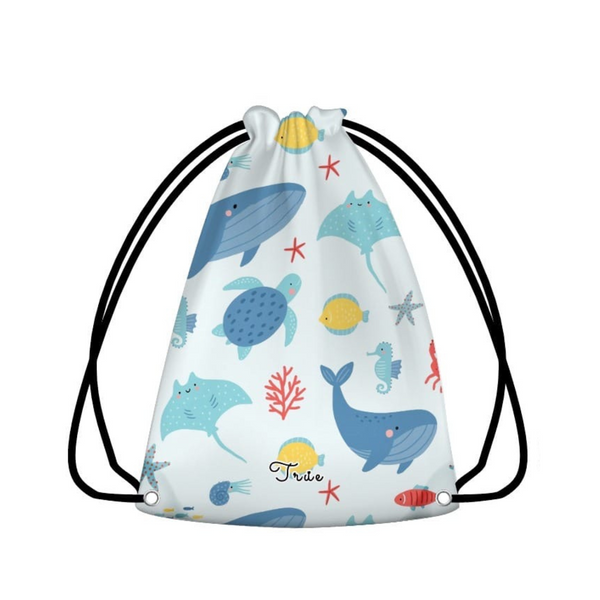 Drawstring bag with ocean-themed design featuring whales, turtles, and fish on a white background.