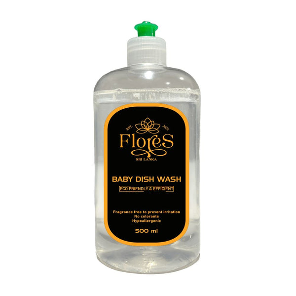 A clear bottle of Flores Eco Baby Dishwash with a green cap and black label with orange accents, displaying the product name and capacity of 500ml.