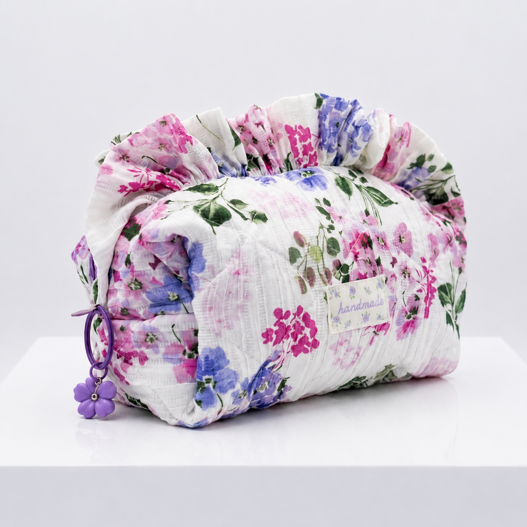 Floral-patterned fabric Makeup pouch on a white background