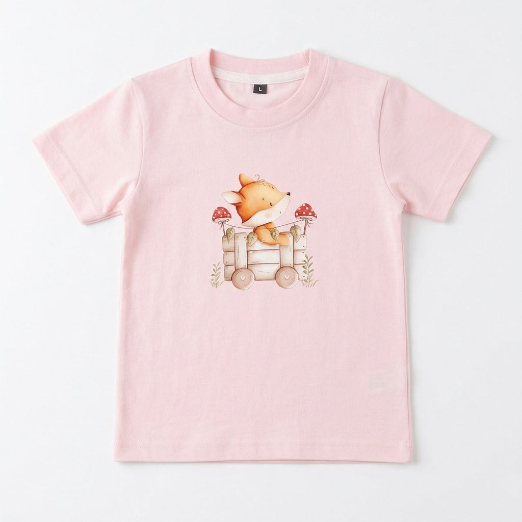 Pink t-shirt with a fox graphic on a white background