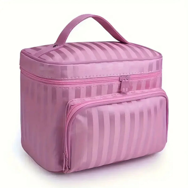 Pink striped cosmetic bag on a white background