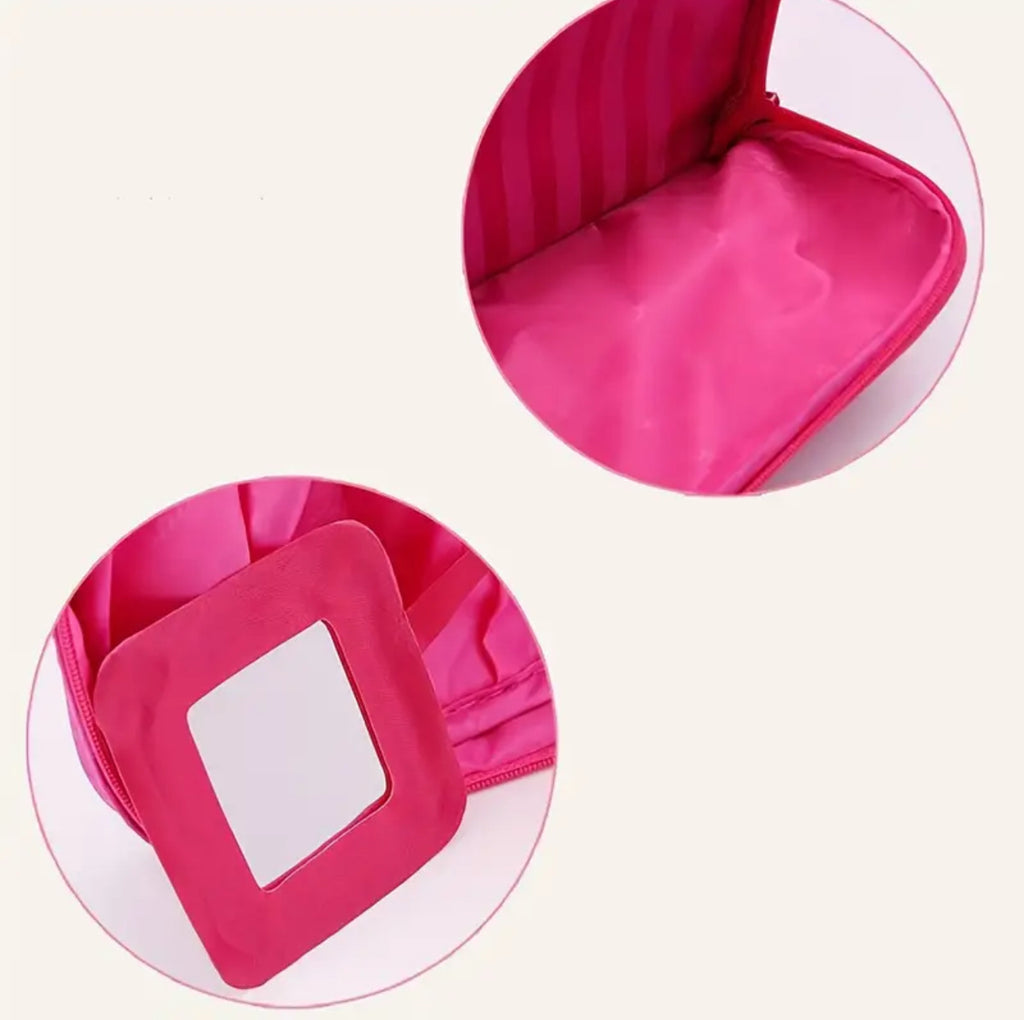 Close-up of a pink product with a windowed compartment on a white background