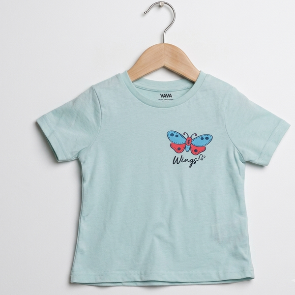 A light blue short-sleeve kids' t-shirt hanging on a wooden hanger against a white wall. The shirt features a colorful butterfly graphic on the chest with the text 'Wings' printed underneath.