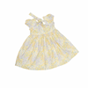 Yellow floral dress with matching headband on a white background