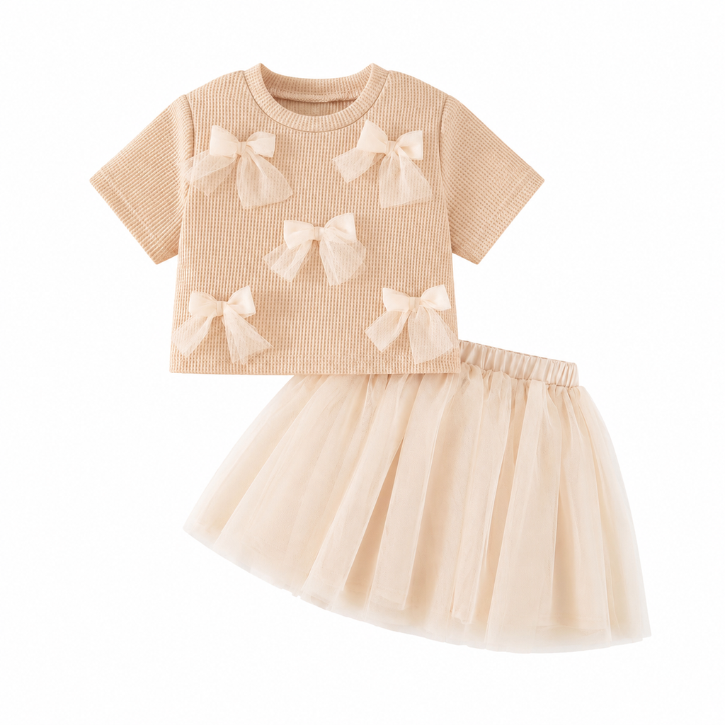 The Girls Bow Top &amp; Tulle Skirt offers a stylish and versatile outfit suitable for various functions or events. 