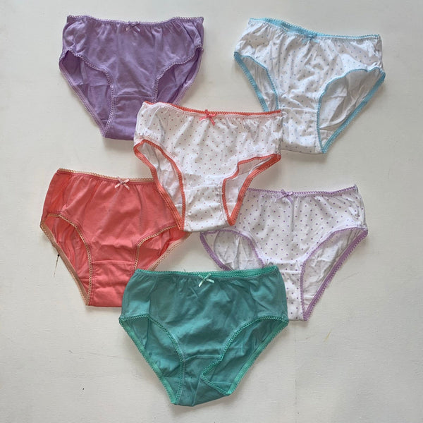 A collection of girls' cotton panties in various colors.