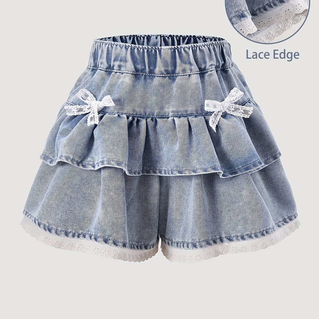 Denim shorts with lace detailing on a light gray background
