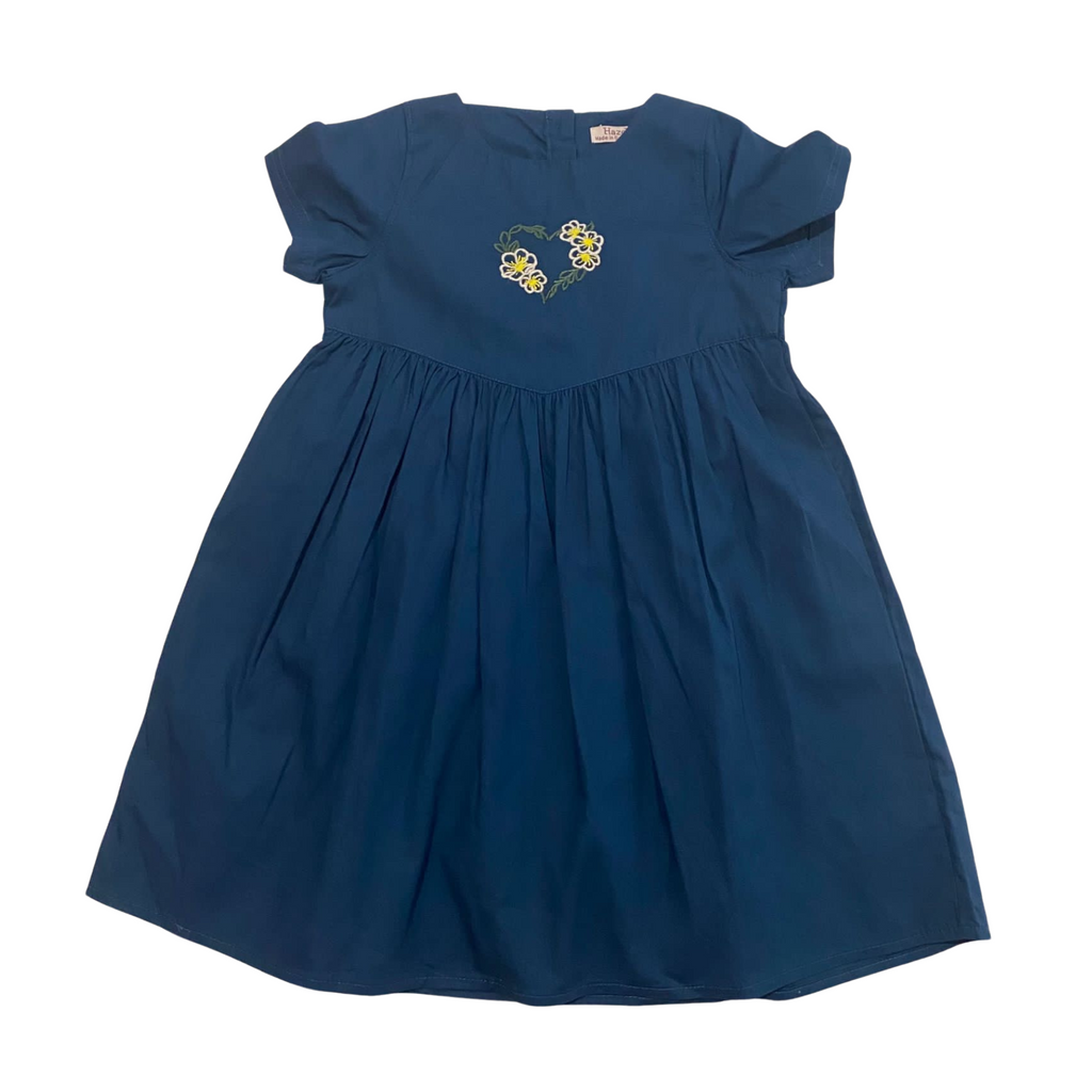 Blue dress with floral embroidery on a white background