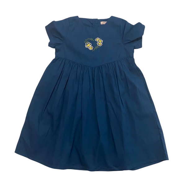 Blue dress with floral embroidery on a white background